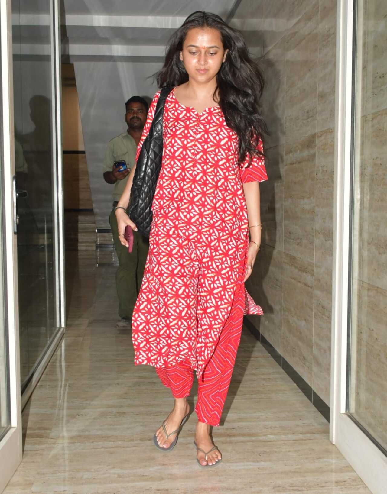 The actress was dressed in a printed red kurta and palazzo
